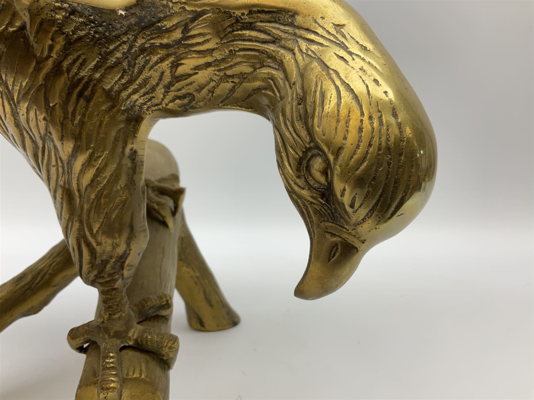 Large brass figure of an eagle on a branch, H51.5cm