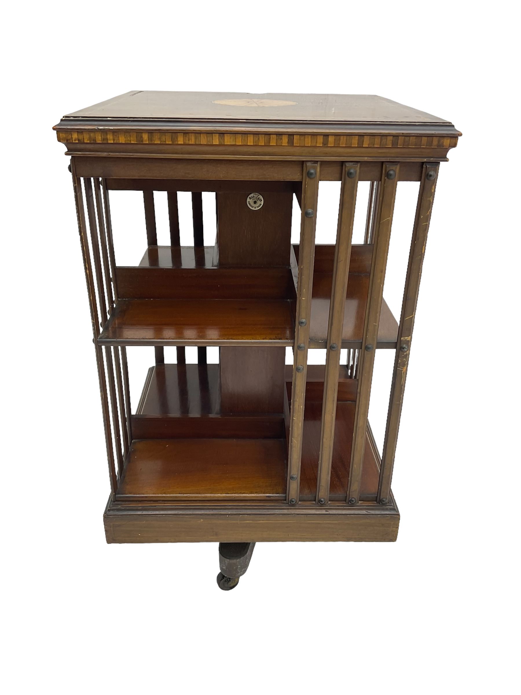 Maple & Co. London - Edwardian mahogany inlaid revolving bookcase, moulded square top with inlaid circular fan motif and satinwood banding, with circular label