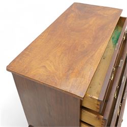 George III mahogany chest, rectangular top over four long cock-beaded drawers, fitted with brass swan neck handles and circular plates, lower moulding over bracket feet 