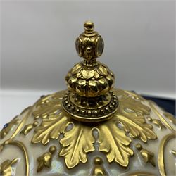 Franklin Mint House of Faberge; The Faberge Imperial Carousel Egg, with a carousel that revolves to the sound of the musical box operated by the winding key finial, H27cm