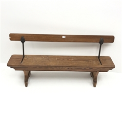 H Addison & Co Wellington Salop pitch pine and wrought metal reversible bench, W138cm