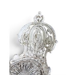 Pair of white painted cast metal garden chairs, ornate reclined backs, circular pierced seats on cabriole legs