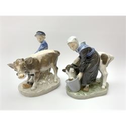 Two Royal Copenhagen figures, Boy with calf, model no 772 and Girl with cow, model no 779, tallest H17cm.