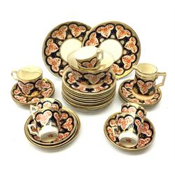 Wileman & Co (Foley) teawares, in the 'Japan' Imari pattern, no 3464, comprising six coffee cans and twelve saucers, eleven side plates, one moustache cup and one saucer, two cake plates, milk jug, and slop bowl. 
