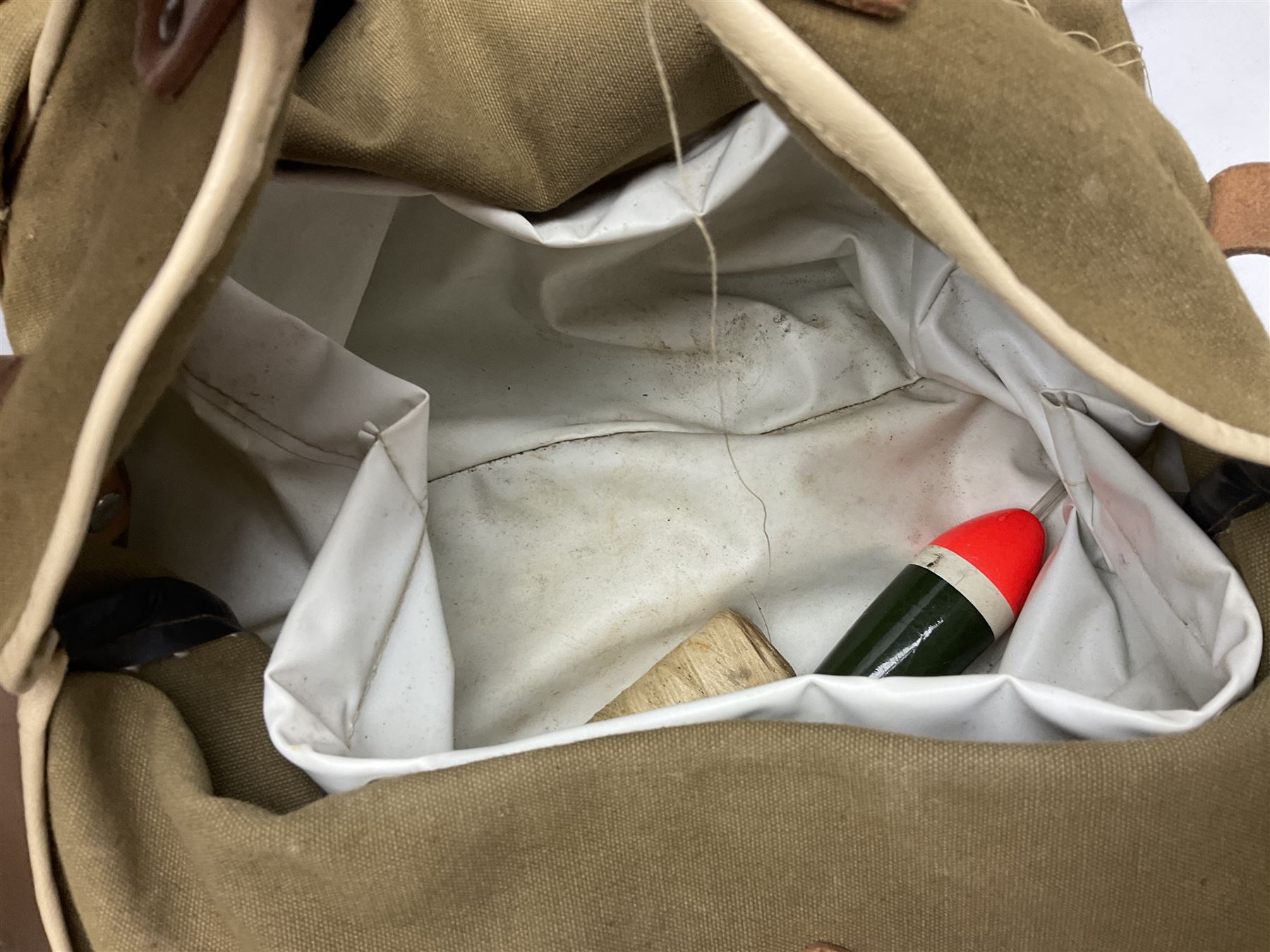 Four Abu fishing reels, comprising Ambassadeur 9000, Ambassadeur 7000, Ambassadeur 5500 and Ambassadeur 6500, together with additional line, hardy fishing bag and two wooden boxes