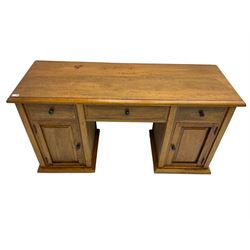 Hardwood twin pedestal desk, fitted with three drawers and two cupboards