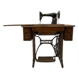 Singer treadle sewing machine, oak case