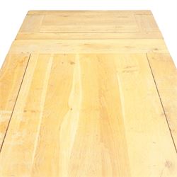 Modern solid oak extending dining table and eight upholstered chairs, the table of plank top construction raised on square supports, extended to 231cm with leaves 