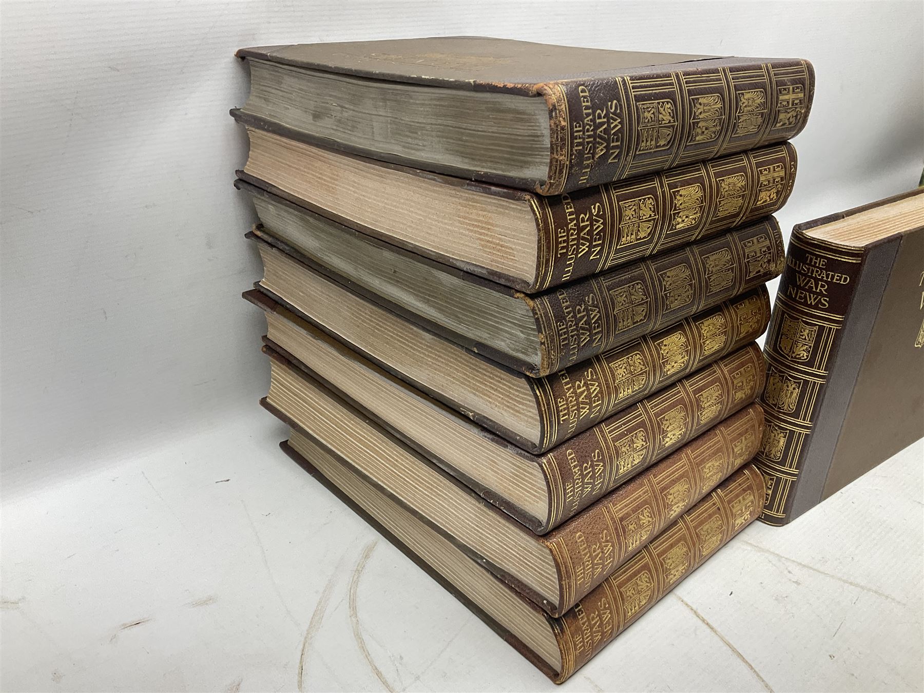 The Illustrated War News - Being a Pictorial Record of the Great War. Parts 1 -96 August 12th 1014 - June 7th 1916 uniformly bound in eight oblong quarto volumes with half-leather/gilt binding. Published by The Illustrated London News (8)