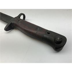 Australian Owen sub-machine gun bayonet, the 25.5cm fullered steel blade marked '53'; in metal bound wooden scabbard marled MA53 L41cm overall