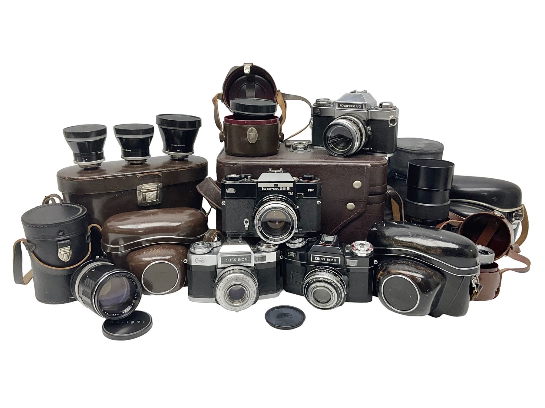 Four Zeiss Ikon camera bodies, to include, Contaflex Super B camera body, serial no. B31591, with 'Carl Zeiss Tessar 2.8/50 lens, serial no.3425553, Contaflex Super BC camera body, serial no. P81728, with 'Carl Zeiss Tessar 2.8/50' lens, serial no 4822280, etc, together with three cased lenses; 'Carl Zeiss Pro-Tessar 1:4 f=115mm' lens, serial no 3734740, 'Carl Zeiss Pr-Tessar 1:3.2 f=85mm' lens, serial no. 3647764 and 'Carl Zeiss Pr-Tessar 1:3.2 f=35mm' lens, and other Zeiss Ikon equipment 