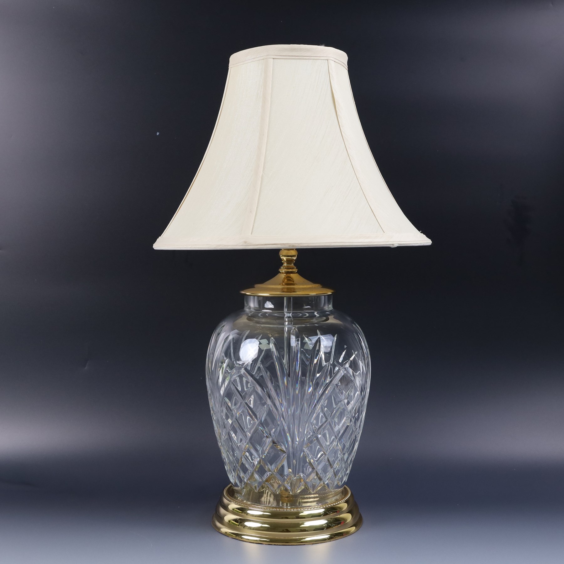Waterford crystal table lamp, upon a circular gilt metal base, with shade H52cm