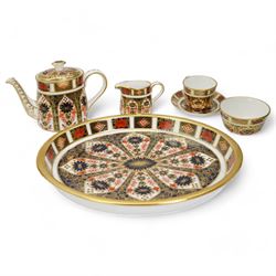Royal Crown Derby 1128 miniature tea set, Derby Posies miniature tea set, a teacup and saucer, a twin handled mug and Royal Worcester miniature teacup and saucer 