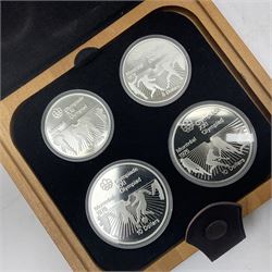 Six Queen Elizabeth II The Royal Canadian Mint silver proof four coin sets, to commemorate the 1976 Montreal Olympic Games, each set containing two five dollar coins and two ten dollar coin with Queen's head obverse and designs to the reverse relating to the Olympic Games, all in the original display cases and outer card boxes with certificates