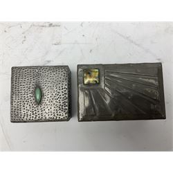 Arts & Crafts style hammered pewter box the lid with applied cabochon, together two other similar examples and a fourth pewter box embossed with flowers, tallest example H9.5cm
