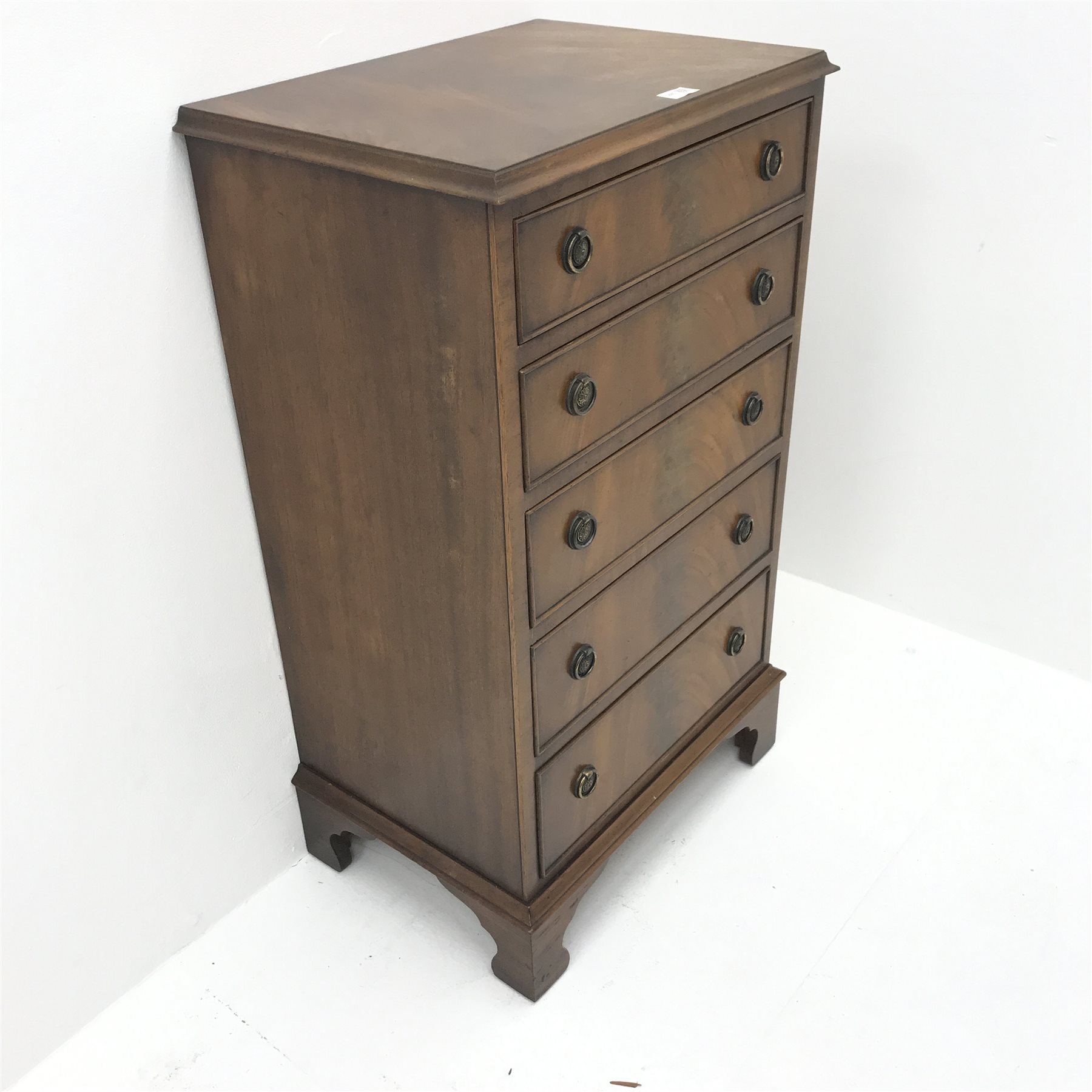 Regency style mahogany bow front chest, five graduating drawers