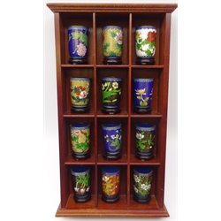  Set of twelve Chinese Cloisonne cylindrical vases on stands, on mahogany wall mounted display shelf, H51cm x W29cm   