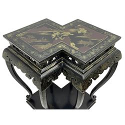 Chinese black lacquer double jardinière stand, the double-lozenge top painted with traditional landscape scenes within a gilt strung border, the pierced frieze with trailing foliate decoration and geometric patterns over the shaped projecting apron, supported on six cabriole supports united by a hexagonal undertier, raised on compressed spade feet
