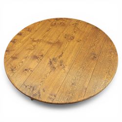 Traditional oak circular pedestal dining table, circular plank top, turned baluster column above three shaped legs