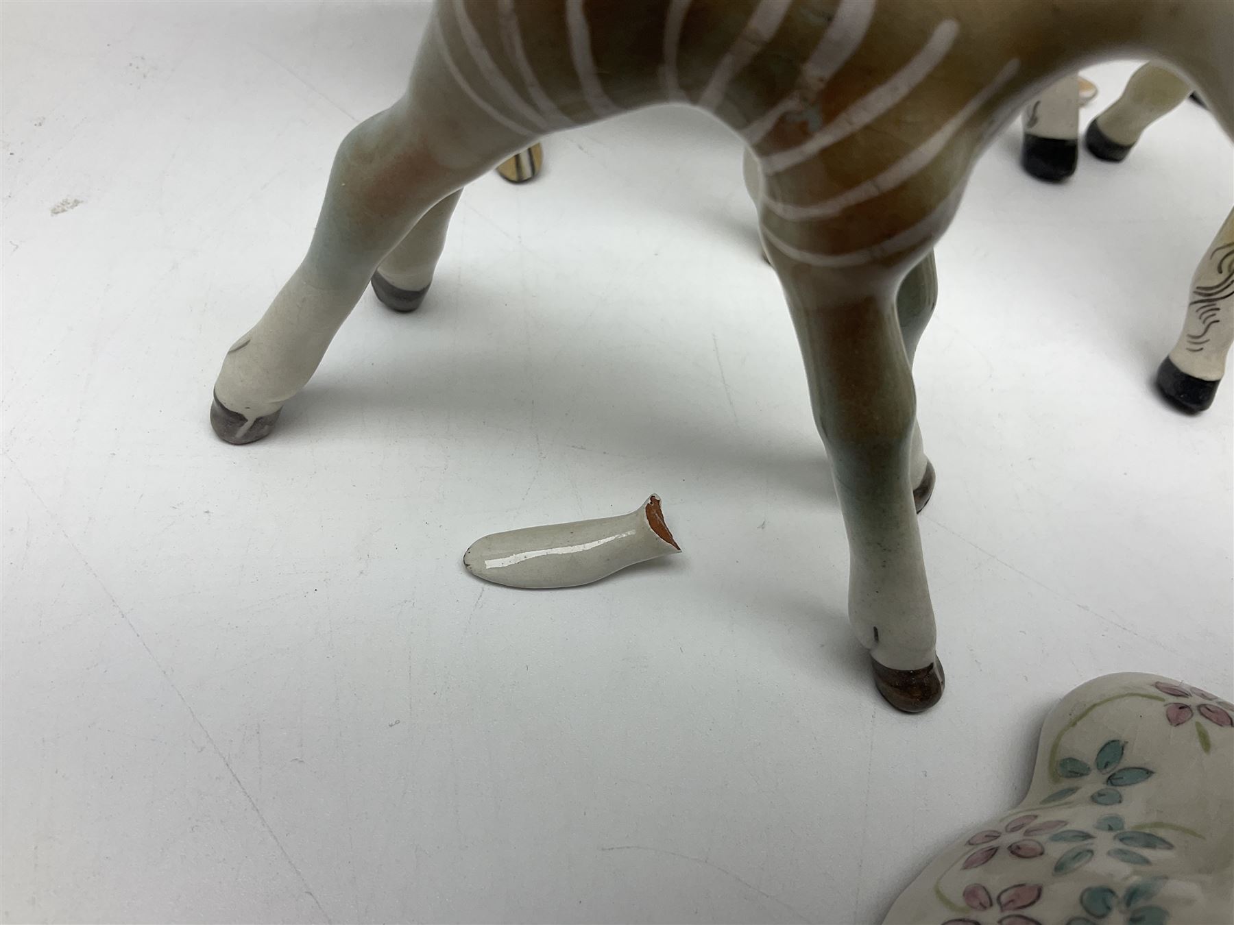 Basil Matthews figures, comprising horses, deer and fawns, all with painted mark beneath, largest H14cm