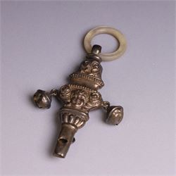 Edwardian silver rattle, embossed with putti and scrolling decoration, with whistle, bells...