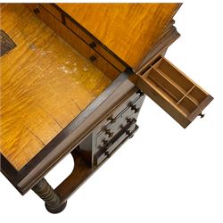 Victorian walnut Davenport, hinged sloping top with inset leather writing surface, enclosing satinwood lined interior with two drawers over faux drawer, fitted with inkwell drawer and pen compartment to the side over four drawers with an opposing false set, raised on spiral turned supports united by a shaped platform base