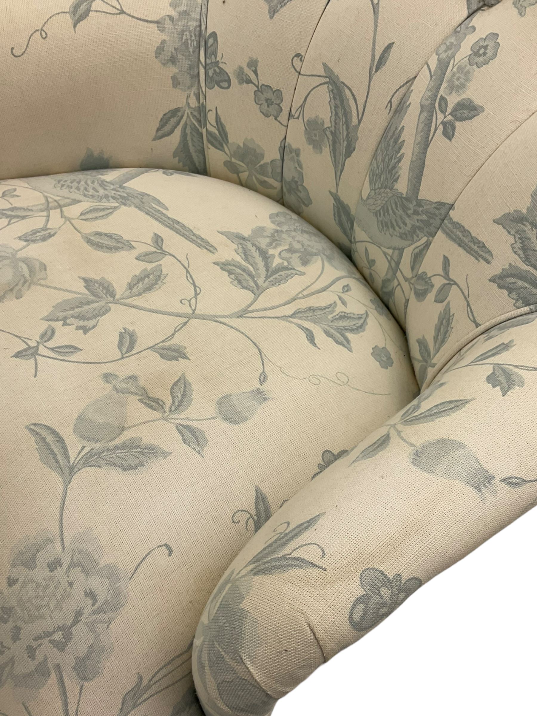 Victorian style bedroom chair, upholstered in light fabric decorated with birds and foliate, turned front feet