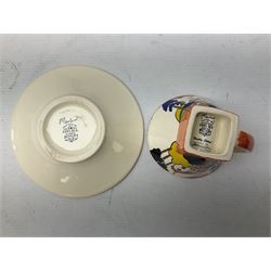 Two limited edition Bradford Exhange Clarice Cliff Age of Jazz beakers, no 289/4,999, with certificate, in box, together with a Moorland Art Deco Clarice Cliff style Huntley Cottage pattern teacup and saucer 