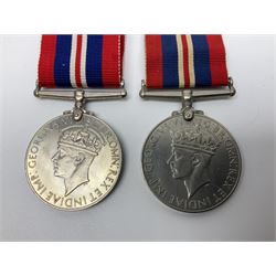 Ten WW2 medals comprising two 1939-1945 war medals, two Defence medals, two 1939-1945 Stars, two Africa Stars, France & Germany Star and Burma Star; together with bar of four miniature medals; all with ribbons