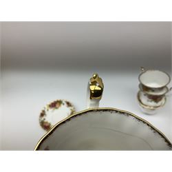 Royal Albert Old Country Roses pattern tea set, comprising teapot, coffee pot, six teacups and six saucers, five side plates, further teacup with joined saucer and side plate, open sucrier, milk jug, cake plate, and preserve pot and cover, together with Royal Albert Jubilee Rose pattern sauce boat and stand, and Royal Albert Lavender Rose pattern cake stand. 