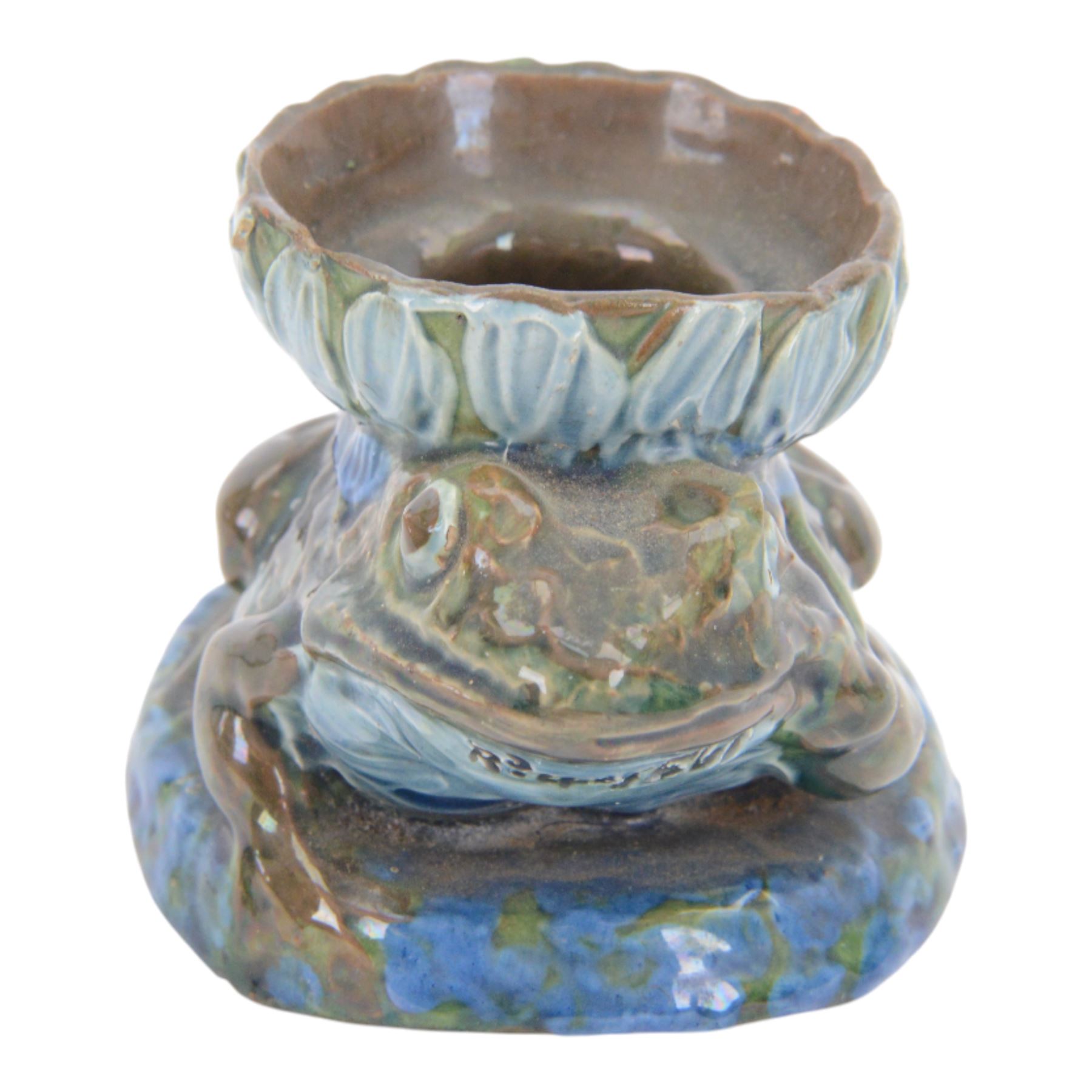 C. H. Brannam pottery Candle holder modelled as a Frog, with  flower upon its back, with signature to base, H8cm 