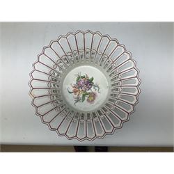 Early 20th century Dresden floral encrusted pierced bowl, centrally painted with flowers, on four tapering supports, D30cm 