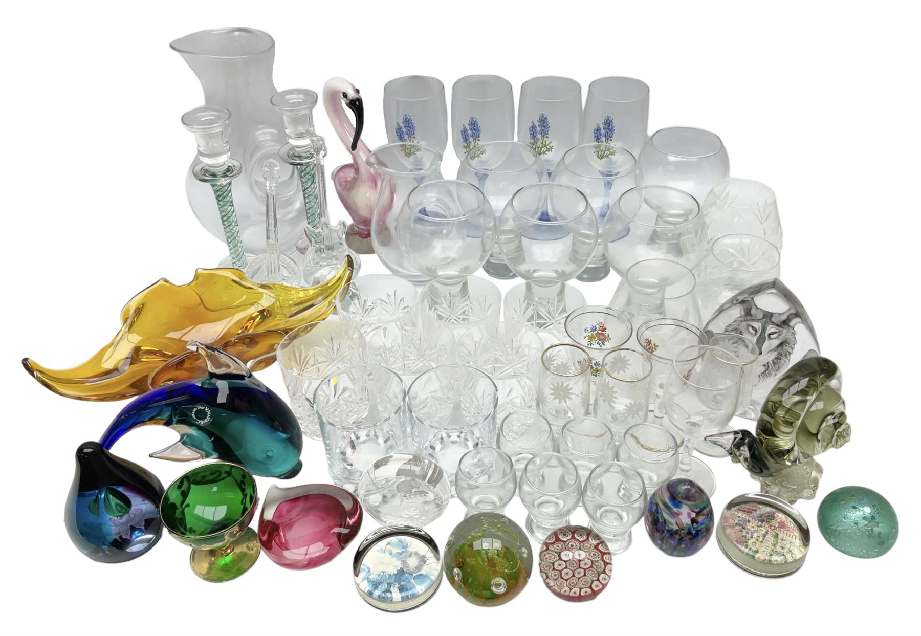 Quantity of glassware to include Mats Jonasson colour wolf paperweight, Murano dolphin and flamingo figures, Caithness Dignity and Tango paperweights, set of six Edinburgh Crystal glass tumblers, art glass dish etc