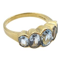 9ct gold graduating five stone oval blue topaz ring, Birmingham import mark 1995 