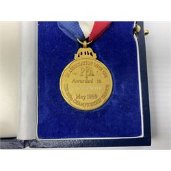 9ct gold Football League 100 League Legends medal, awarded to Raich Carter, inscribed The Football League, 100 League Legends, PFA Awarded  To Raich Carter May 1999, In Association With The 100th Championship Season, red, white and blue ribbon with clasp inscribed LEGEND, in original fitted case 30gms. The Football League 100 Legends is a list of 100 great footballers who played part or all of their professional career in English Football League and Premier League football. The players were selected in 1998 by a panel of journalists, including veteran reporter Bryon Butler, and the list was intended to reflect the League's history by including players from throughout the preceding 99 seasons. It is complete with the booklet for the Evening of Legends Gala Dinner Thursday May 13th 1999 at The Hilton Hotel London signed by numerous of the legends including Ossie Ardiles, Colin Bell, John Charles, Ray Clemence, Tom Finney, Trevor Francis, Paul Gascoigne, Johnny Haynes, Nat Lofthouse, Stanley Matthews, Malcolm Macdonald, Martin Peters, Len Shackleton, Peter Shilton, Alex Young etc; an official photograph of the legends taken at the dinner; related contemporary newspaper cutting etc. Provenance: By direct descent from the family of Raich Carter having been consigned by his daughter Jane Carter.