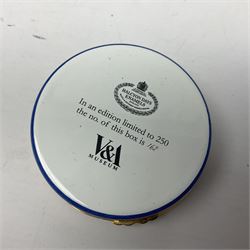 Halcyon Days bonbonniere, modelled as pink roses in a planter painted with a blue and white Japanese scene, together with five Halcyon Days enamel boxes, one a larger example depicting 'The Becket Casket' and four smaller boxes, including The 1993 Easter Egg, Happy Birthday and Statue of Liberty examples, all boxed, Becket Casket D8cm