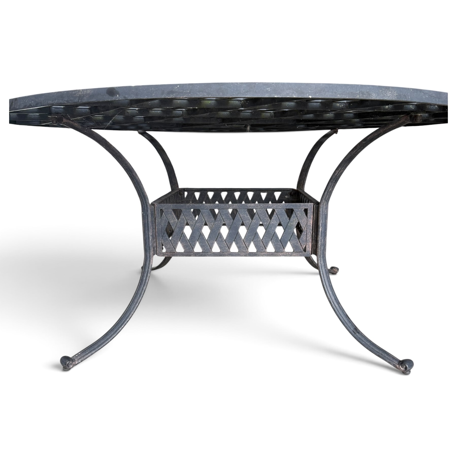 Grey-painted cast metal garden dining suite, comprising circular latticework table on splayed supports (W152cm H72cm), and six matching open armchairs with lattice backs and seats (W61cm H93cm)