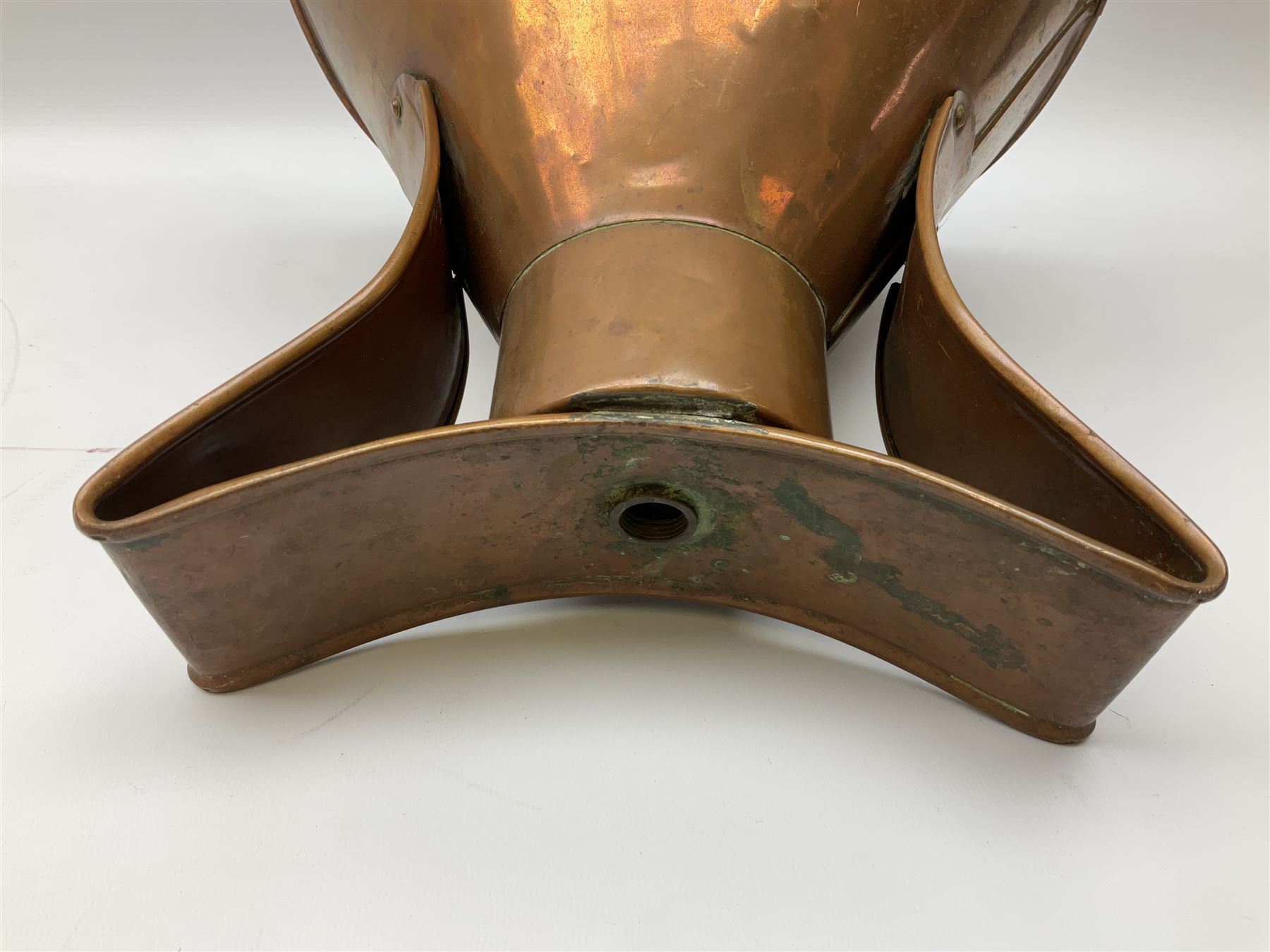 Agricultural copper corn funnel, H32.5cm, another similar copper funnel and copper warming platter of oval form, with twin handles on four supports, with removeable warming plate, L49cm