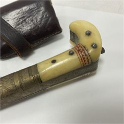Afghan Khyber knife (Choora), blade engraved along the top edge with ornate brass and bone grip, with leather scabbard, overall L31cm, blade L20cm