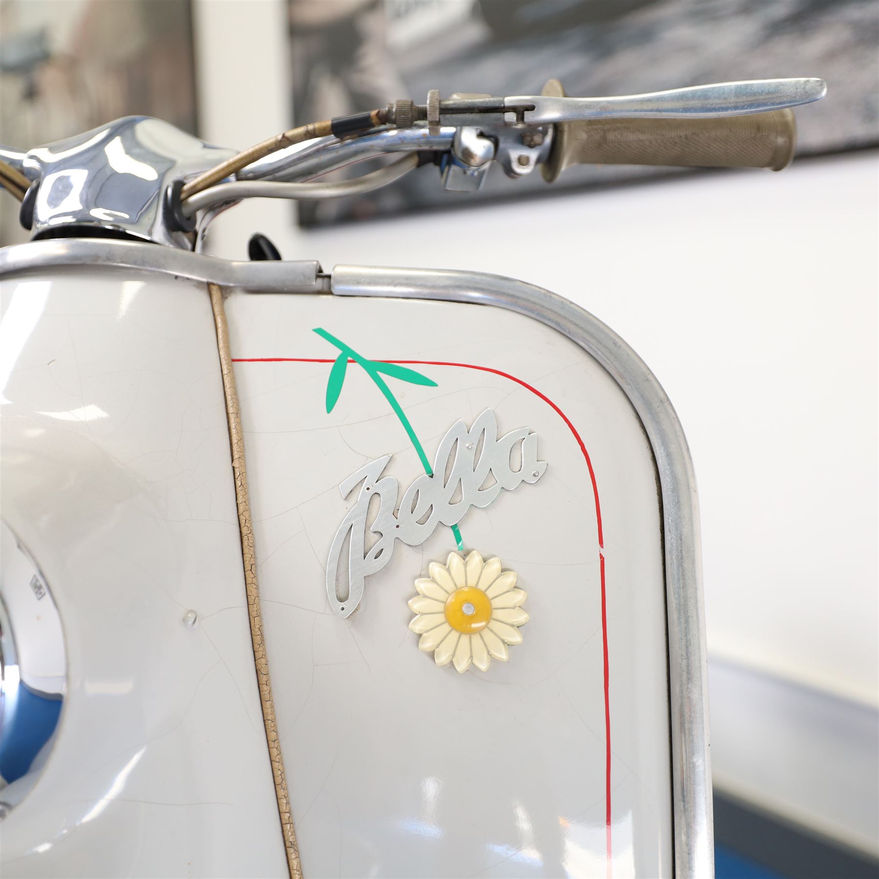 1957 Zündapp Bella R154 Scooter

• Registration: 150 KPU
• Year: 1957
• Model: Bella R154
• Engine: 150cc two-stroke single-cylinder petrol
• Transmission: Four-speed manual
• Odometer reading: 1,727 miles
• Colour: Ivory
• Seating: Dual seat
• V5C: Present
• Original registration book: Present
• Keys: 1

A characterful 1957 Zündapp Bella R154 scooter, finished in ivory with a contrasting brown dual seat and displaying an odometer reading of 1,727 miles.

The Bella R154 formed part of Zündapp’s distinctive range of German touring scooters, combining a 150cc air-cooled two-stroke engine with four-speed transmission, large wheels and substantial pressed-steel bodywork. This example retains its enclosed front apron, central headlamp, chrome handlebars, brightwork, period VDO speedometer and decorative Bella badging.

An operation and maintenance manual is include and accompanied by its V5C and original registration book from 1957.

This vehicle forms part of the Estate of the Late John Sills and is offered for sale by the Executors, confirming a genuine reason for sale.