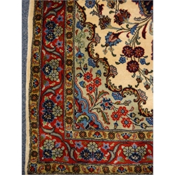  Kolya red and beige ground rug, floral field, 215cm x 126cm  