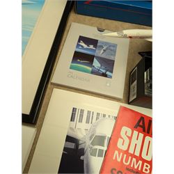 Collection of Concorde memorabilia, including paperweight, limited edition print, calendars, scale model, etc 