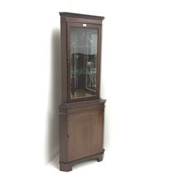 20th century mahogany corner display cabinet, single glazed door enclosing two shelves above single cupboard door, W67cm, H181cm, D42cm