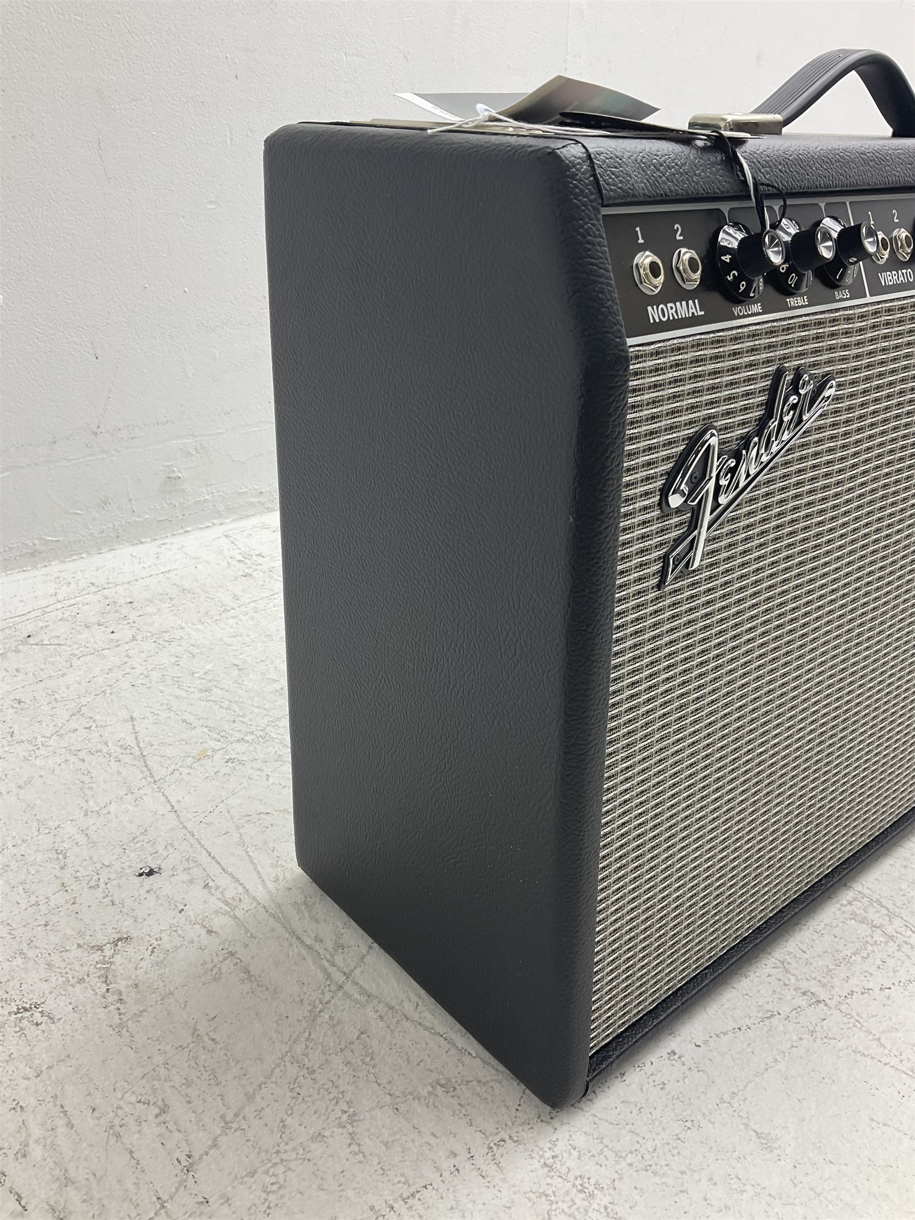Fender Deluxe Reverb combo amplifier; model 65 Deluxe; type PR-239; 100 watts; made in USA; serial no.AC122232; L61cm; with cover