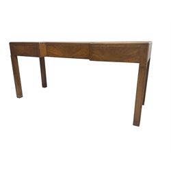 Art Deco mahogany and walnut inverted break front console table, fitted with three drawers each with sunburst design veneered facias, raised on square supports with rectangular carved insets