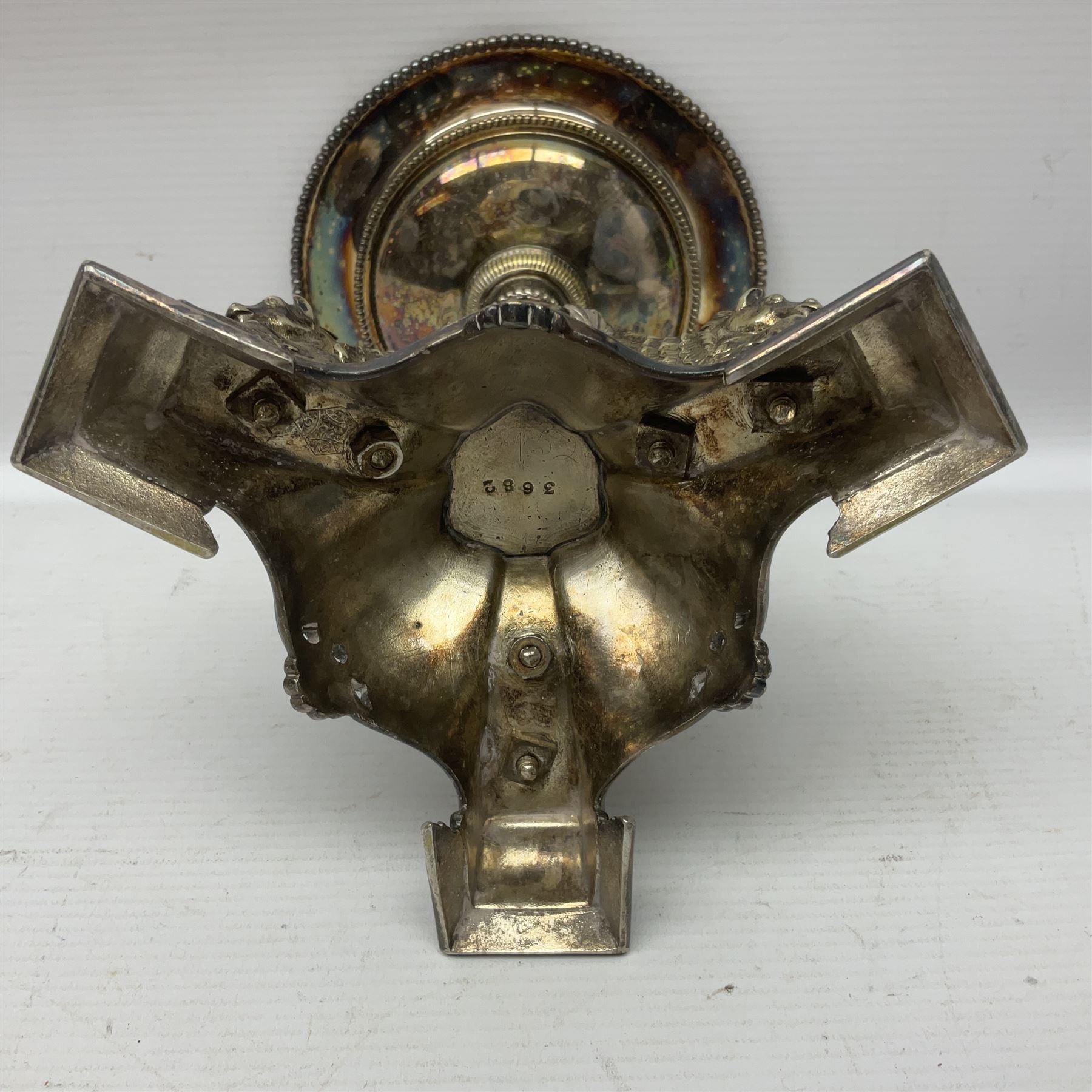 Silver plated centrepiece, with a triform base formed as three Hippocampus with beaded detail, numbered 3682 to the base, H18cm 