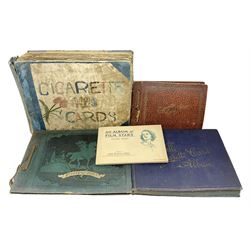 Three albums of cigarette cards including Wills Recruiting Posters, Military Motors and Allied Army Leaders, cricketers etc; another album containing a large quantity of laid-in cigarette cards; and an album of thirty-seven postcards of dogs by Mac (5)