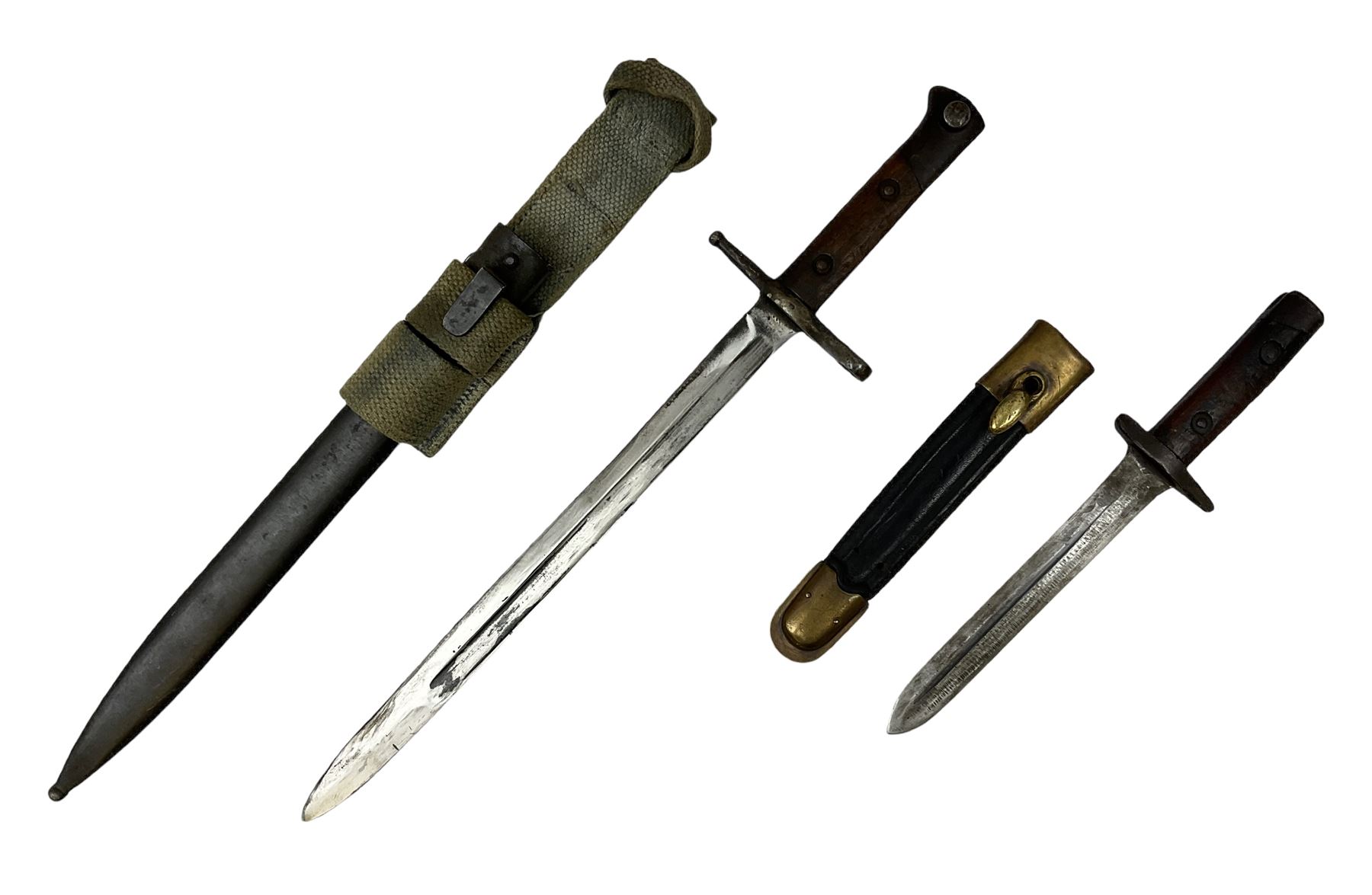 Italian Model 1891 Carcano knife bayonet with 30cm fullered steel blade, the cross-piece stamped VL1110; in steel scabbard with webbing frog L43cm overall; and another Italian fighting knife/bayonet in brass bound leather scabbard (2)