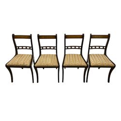 Set of eight Regency style mahogany dining chairs, brass inlay with gilded detail