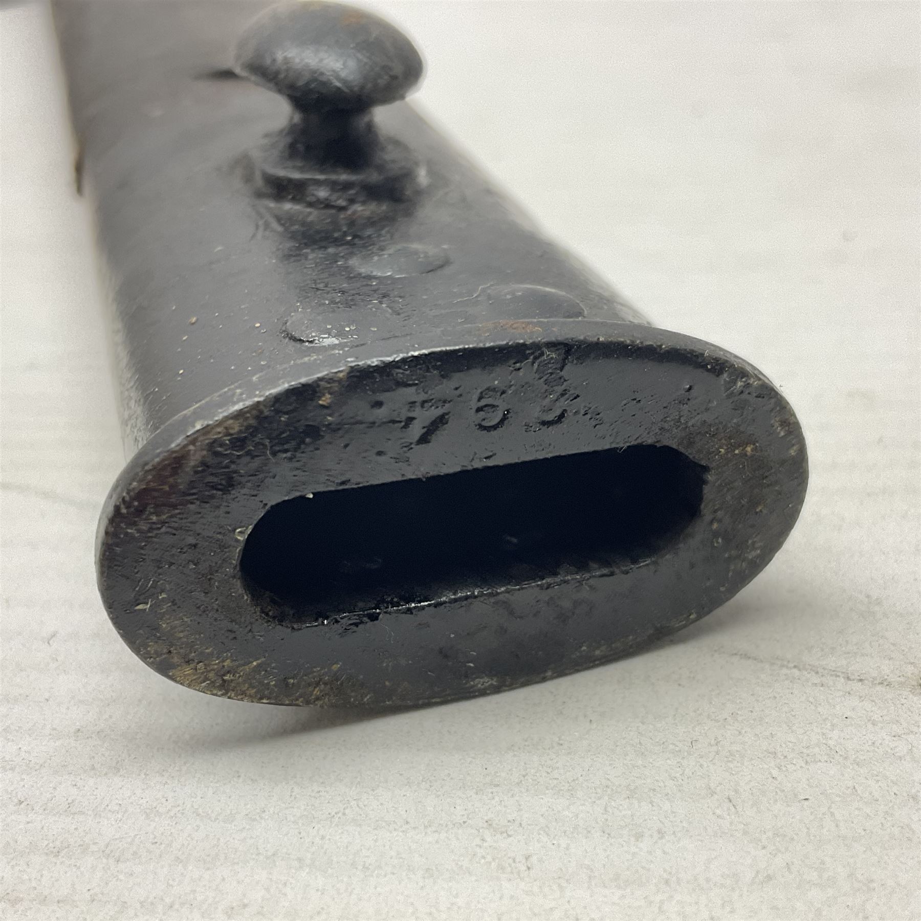 WWI British 1907 pattern bayonet, the 43cm fullered blade by Wilkinson with various marks to the ricasso; in leather covered scabbard numbered 294 to the throat and stamped M/58 L58.5cm overall